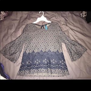 Francesca’s long-sleeve laced blouse